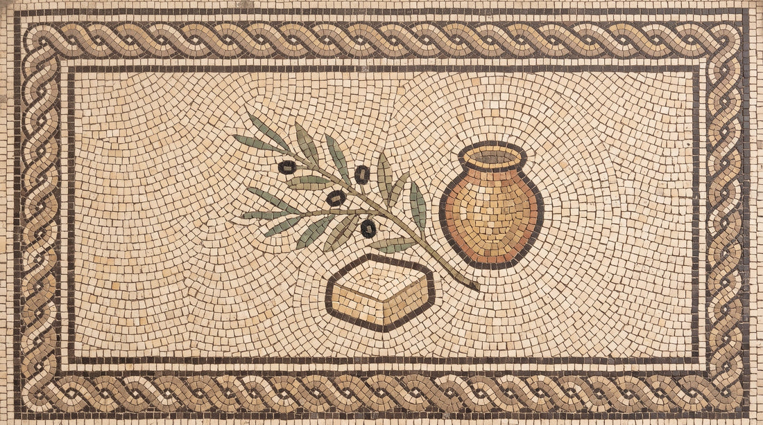 Mosaic illustration of an olive branch, a vessel of olive oil and a bar of palm-free soap.